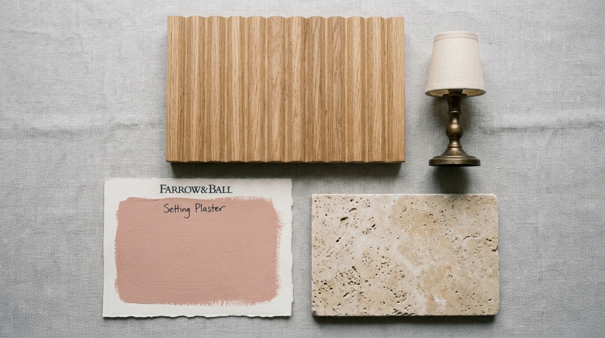 Tactile flat-lay of design materials: fluted oak samples, honed travertine coasters, and brass lamp details intended for modern wall shelves styling. Tactile flat-lay of design materials: fluted oak samples, honed travertine coasters, and brass lamp details intended for modern wall shelves styling.