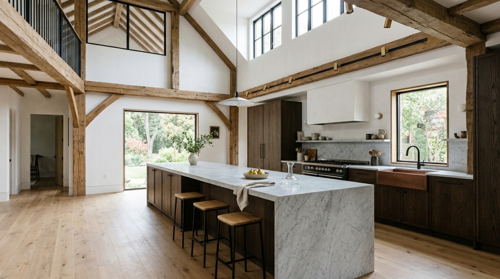 modern country kitchen ideas featuring a double-height ceiling with reclaimed timber trusses and a honed marble linear island. modern country kitchen ideas featuring a double-height ceiling with reclaimed timber trusses and a honed marble linear island.