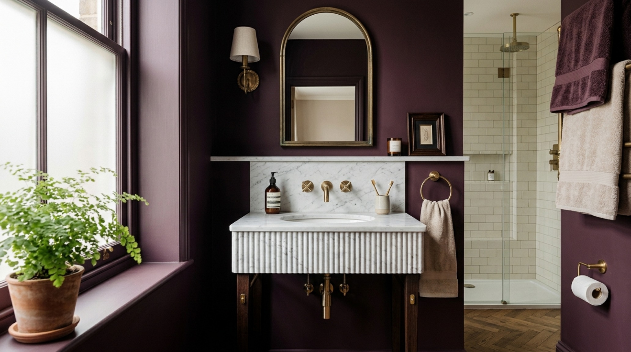small bathroom color palettes featuring a deep plum matte finish paired with brushed brass hardware and a fluted marble vanity top small bathroom color palettes featuring a deep plum matte finish paired with brushed brass hardware and a fluted marble vanity top