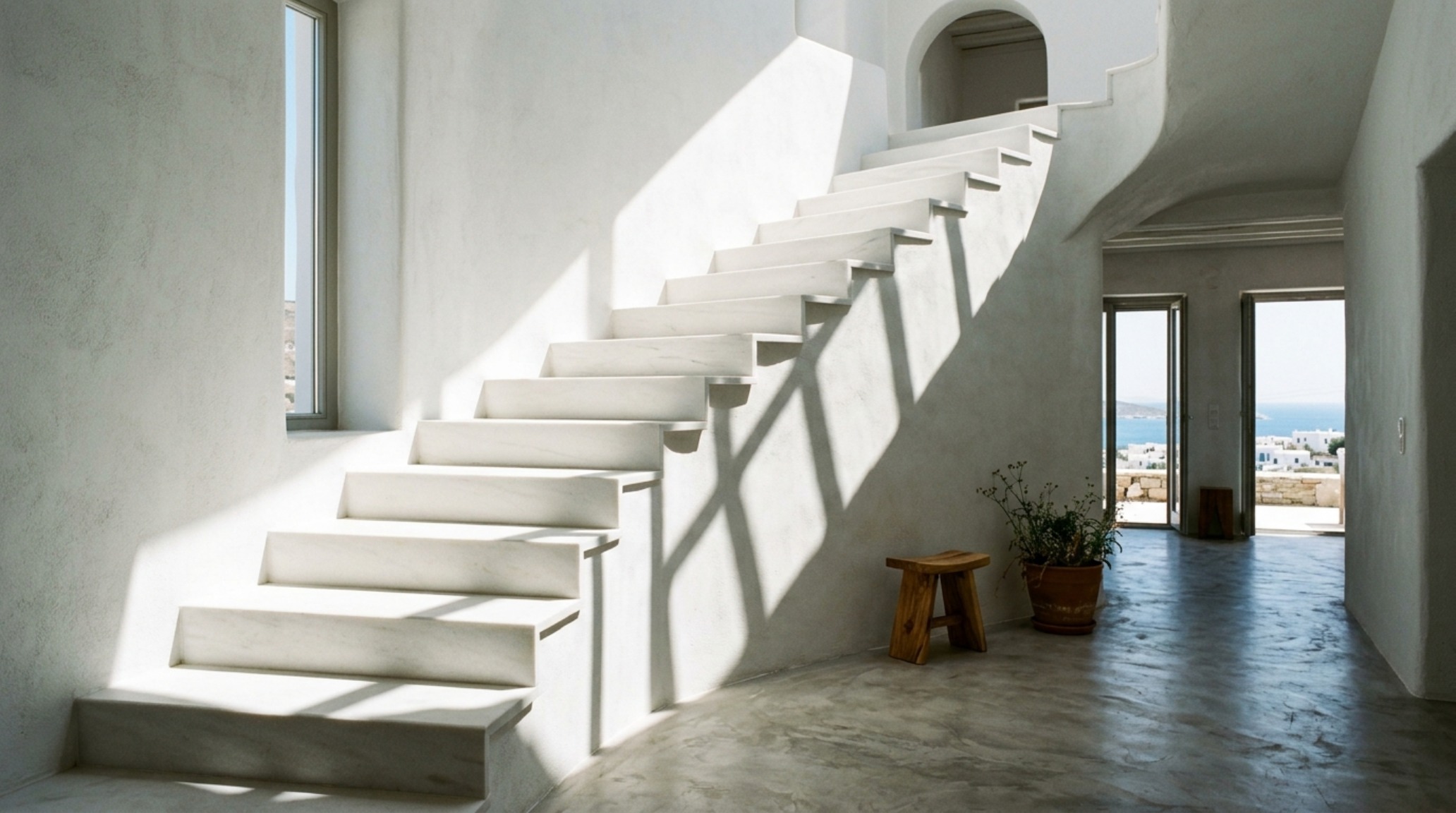 modern cycladic design elements showcasing a minimalist staircase with sharp rectilinear lines and integrated tread lighting at 2700K modern cycladic design elements showcasing a minimalist staircase with sharp rectilinear lines and integrated tread lighting at 2700K