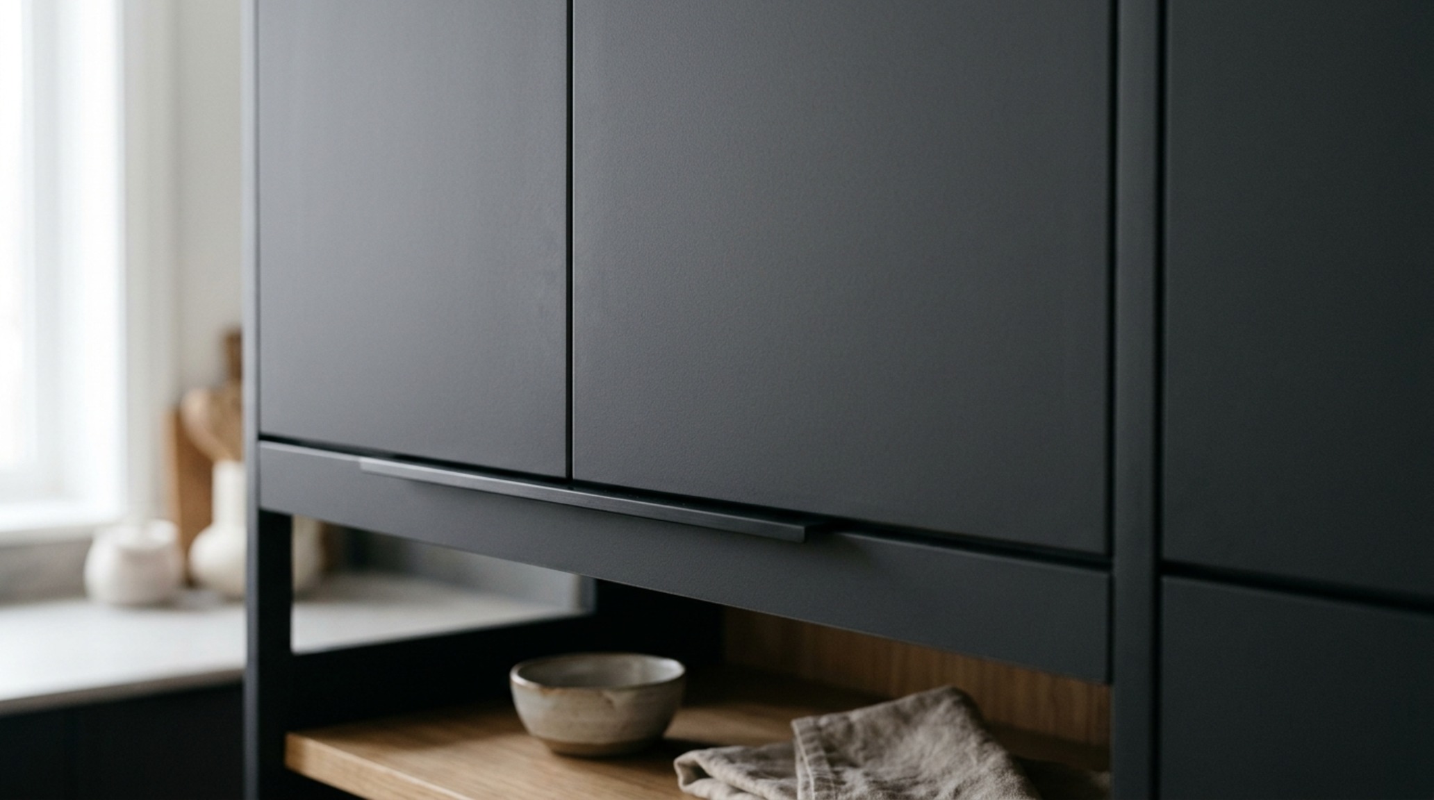 matte finish kitchen cabinets with anti-fingerprint technology and recessed linear LED lighting for a soft, atmospheric glow