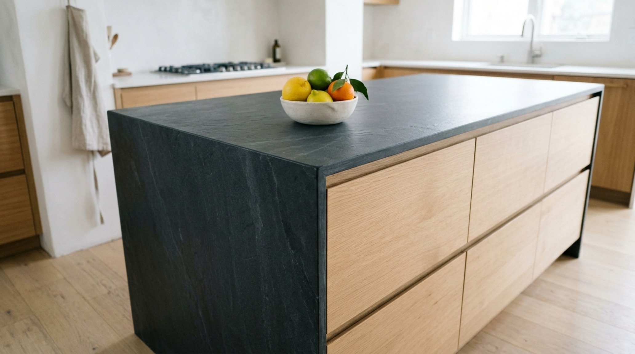 modern interior design advice ideas showing a hardware-less kitchen island with waterfall edges and seamless touch-to-open walnut drawers modern interior design advice ideas showing a hardware-less kitchen island with waterfall edges and seamless touch-to-open walnut drawers