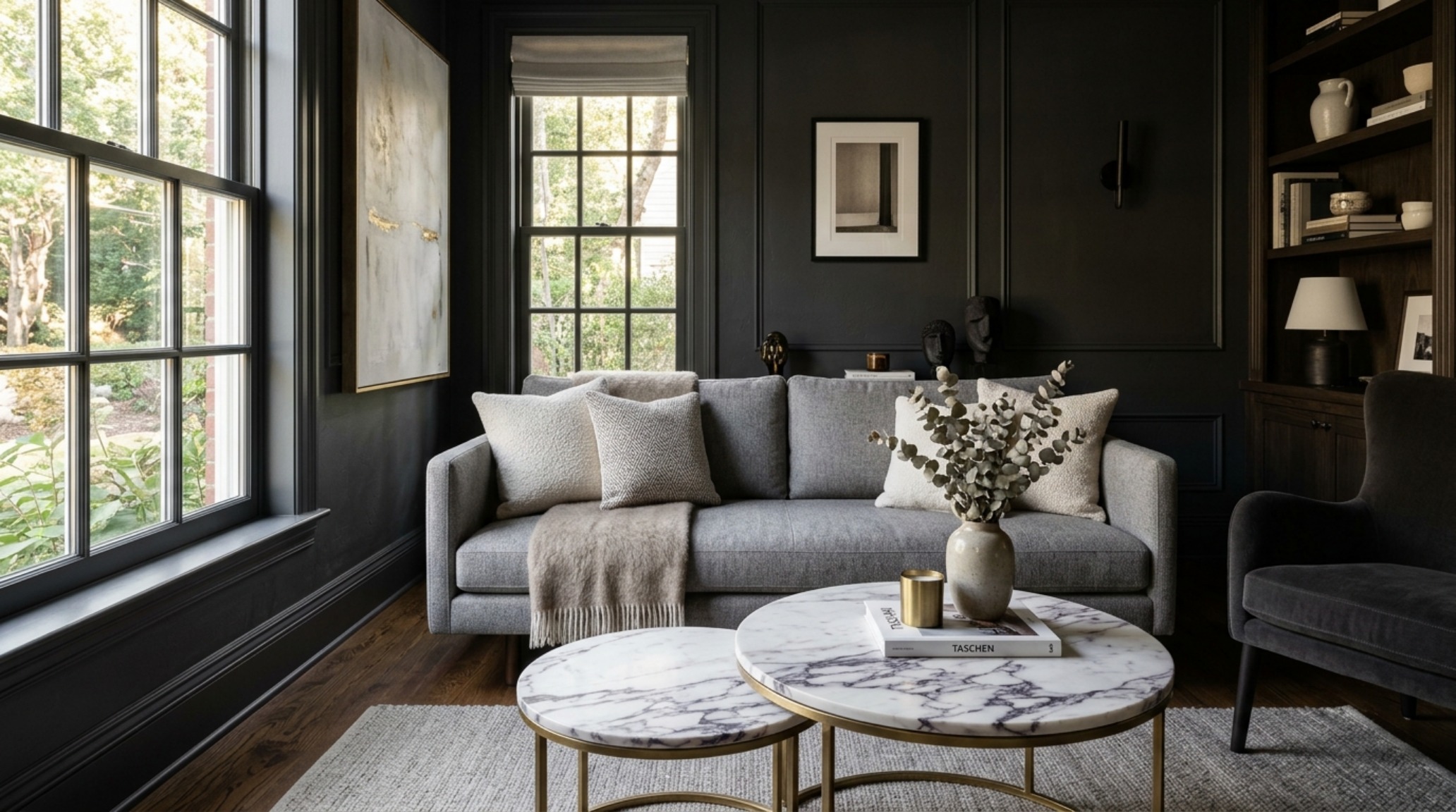The primary living zone featuring a low-profile settee and a collection of nesting coffee tables maintaining an 18-inch reach clearance for optimal ergonomics.