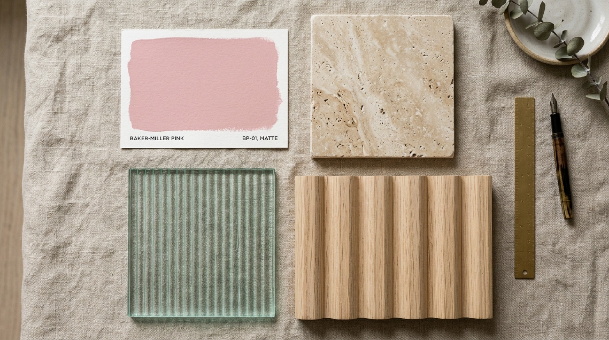 Close-up of luxury textures including honed travertine and ribbed glass, embodying modern barbie movie dreamhouse pink paint shortage decor ideas.