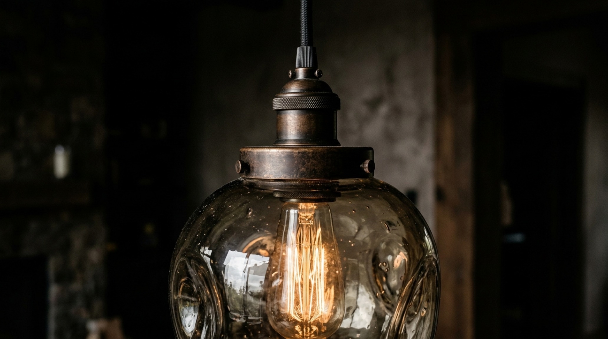 luxury unique hanging lights textures of hand-blown smoked glass and antique bronze hardware in a high-end foyer luxury unique hanging lights textures of hand-blown smoked glass and antique bronze hardware in a high-end foyer