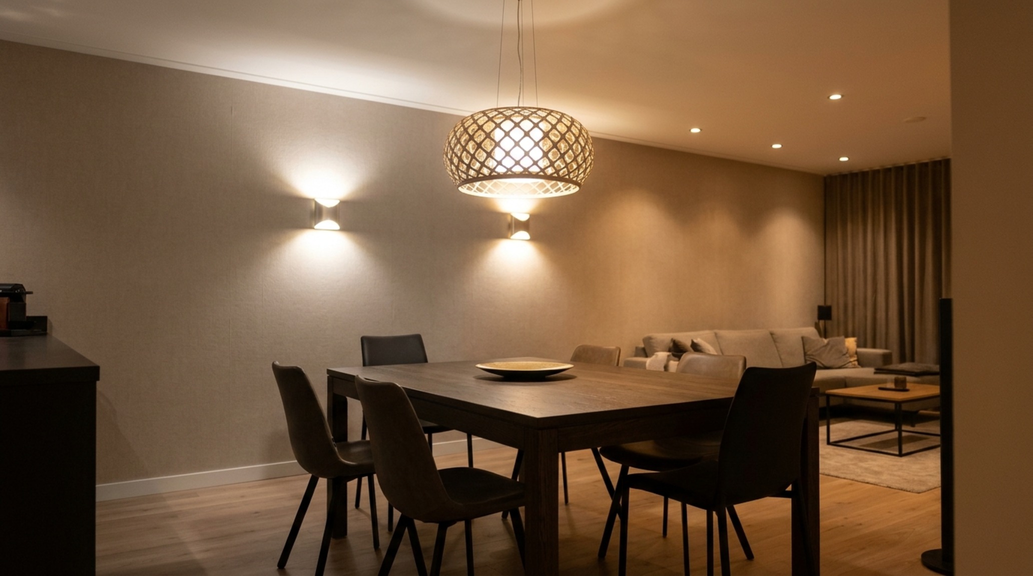 best dining sets lighting guide illustrating layered illumination with 2700K dimmable wall sconces and a central opal glass chandelier