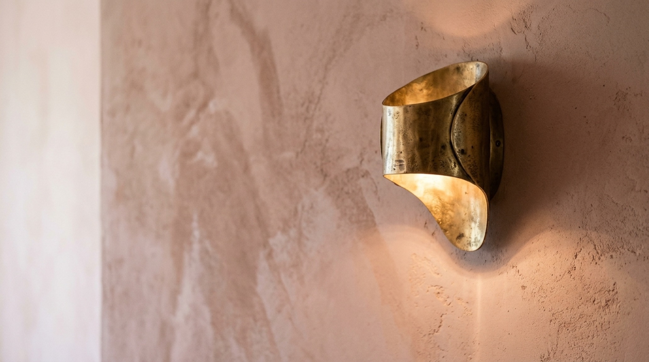 aesthetic bedroom ideas for teens highlighting sculptural wall sconces in brushed brass and the play of light on a textured plaster wall aesthetic bedroom ideas for teens highlighting sculptural wall sconces in brushed brass and the play of light on a textured plaster wall
