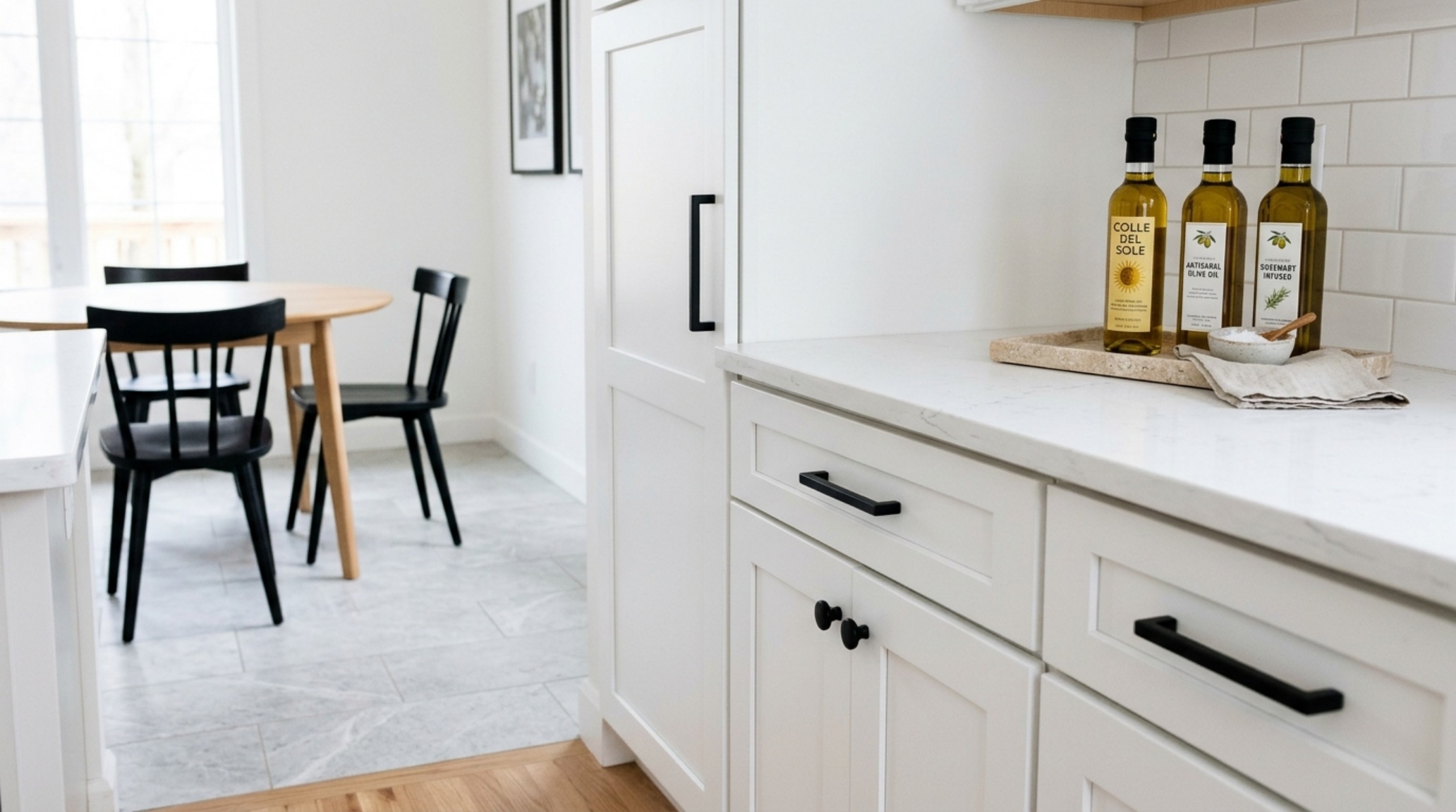 Modern organic kitchen corner with fluted oak details, a honed stone tray, and minimalist brass hardware for a renter-friendly upgrade. Modern organic kitchen corner with fluted oak details, a honed stone tray, and minimalist brass hardware for a renter-friendly upgrade.