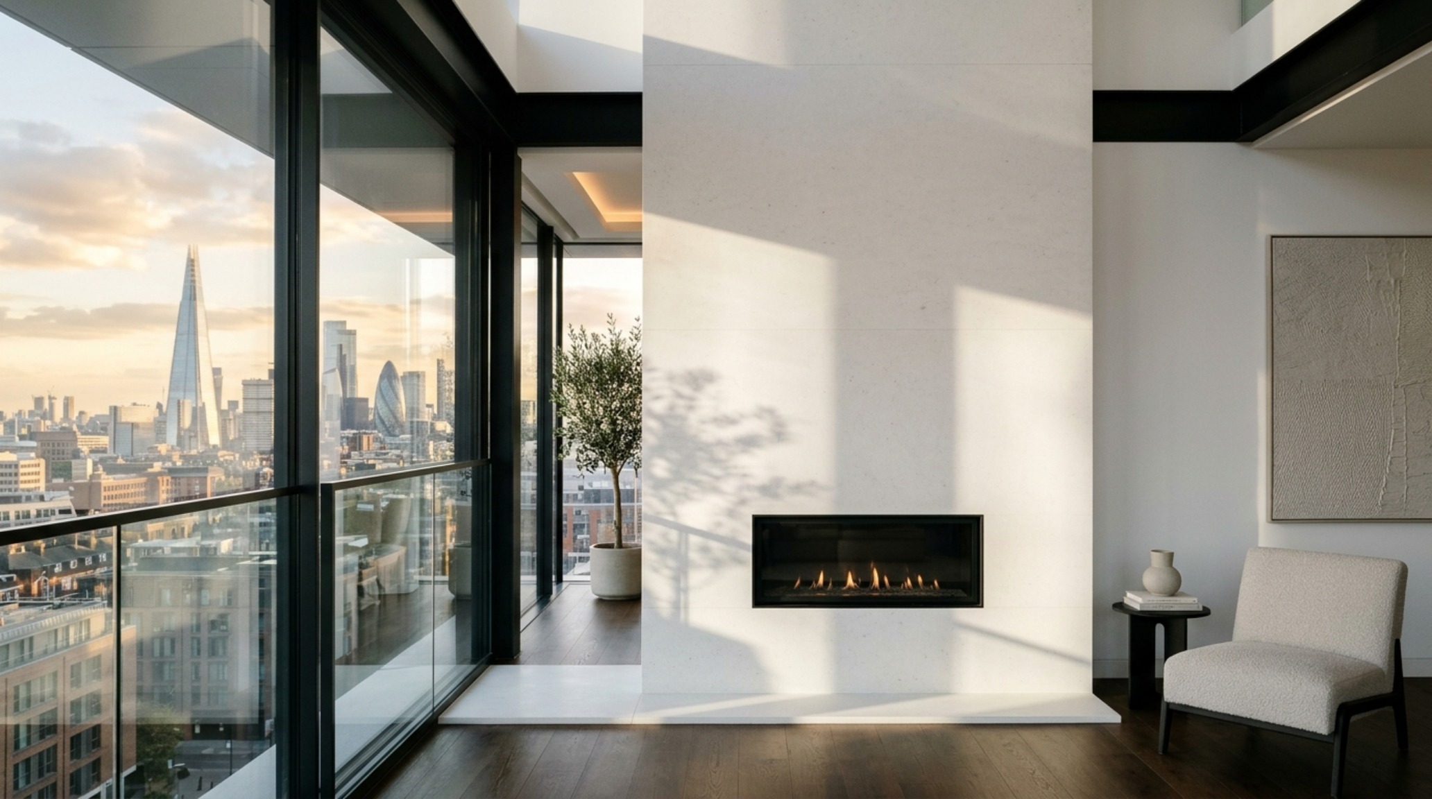 Floor to ceiling stone hearth design with ivory limestone slabs, creating a monolithic and sculptural focal point in a high-ceiling living room.