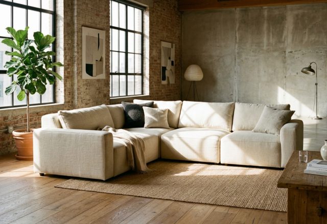 Minimalist modular sofa in cream performance fabric positioned in a sun-drenched living room highlighting best cyber monday couch sales 2025 decor ideas.