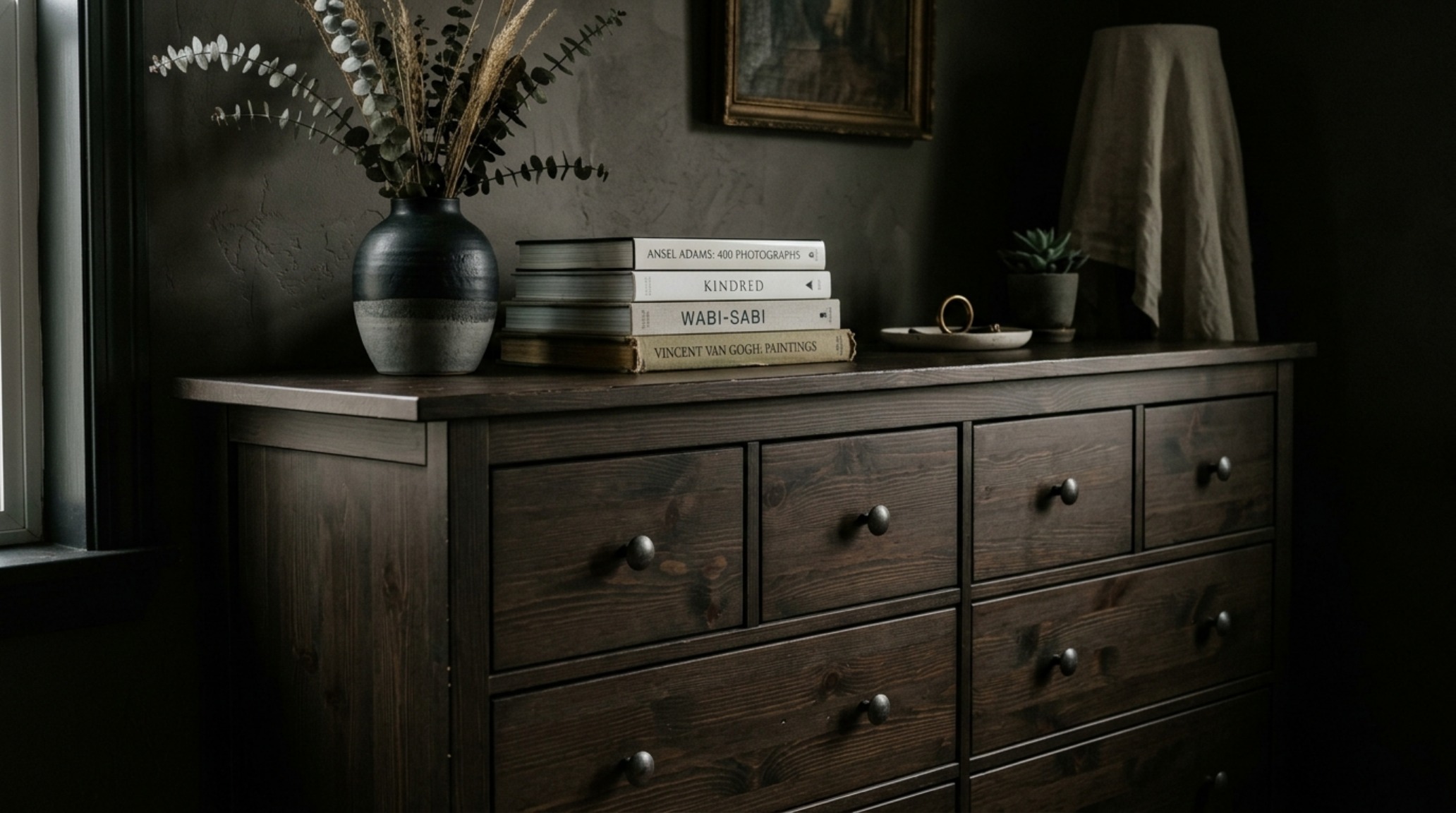 Malm vs Hemnes 2012 review illustrating the 'New Traditionalist' look of a black-brown HEMNES dresser against a soft greige wall for high-contrast sophistication. Malm vs Hemnes 2012 review illustrating the 'New Traditionalist' look of a black-brown HEMNES dresser against a soft greige wall for high-contrast sophistication.