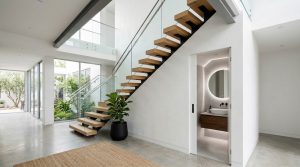 The Architecture Of The Invisible: Mastering Structural Geometry And Headroom In Under Stair Powder Rooms – Visual 5