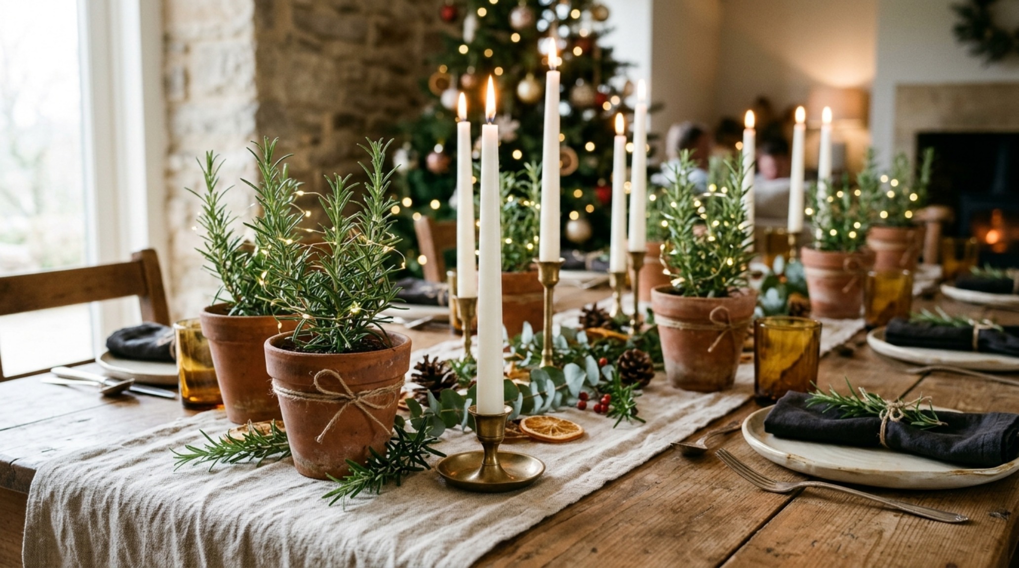 DIY christmas table decor using hand-poured beeswax candles and foraged eucalyptus branches arranged in a low-profile geometric pattern. DIY christmas table decor using hand-poured beeswax candles and foraged eucalyptus branches arranged in a low-profile geometric pattern.