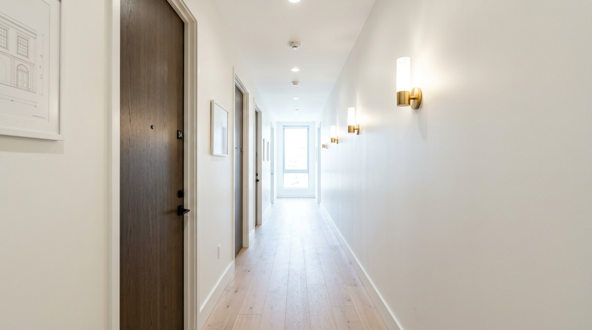 light reflectance value in design illustrated in a narrow corridor using high LRV paint and integrated LED lighting to expand sightlines. light reflectance value in design illustrated in a narrow corridor using high LRV paint and integrated LED lighting to expand sightlines.