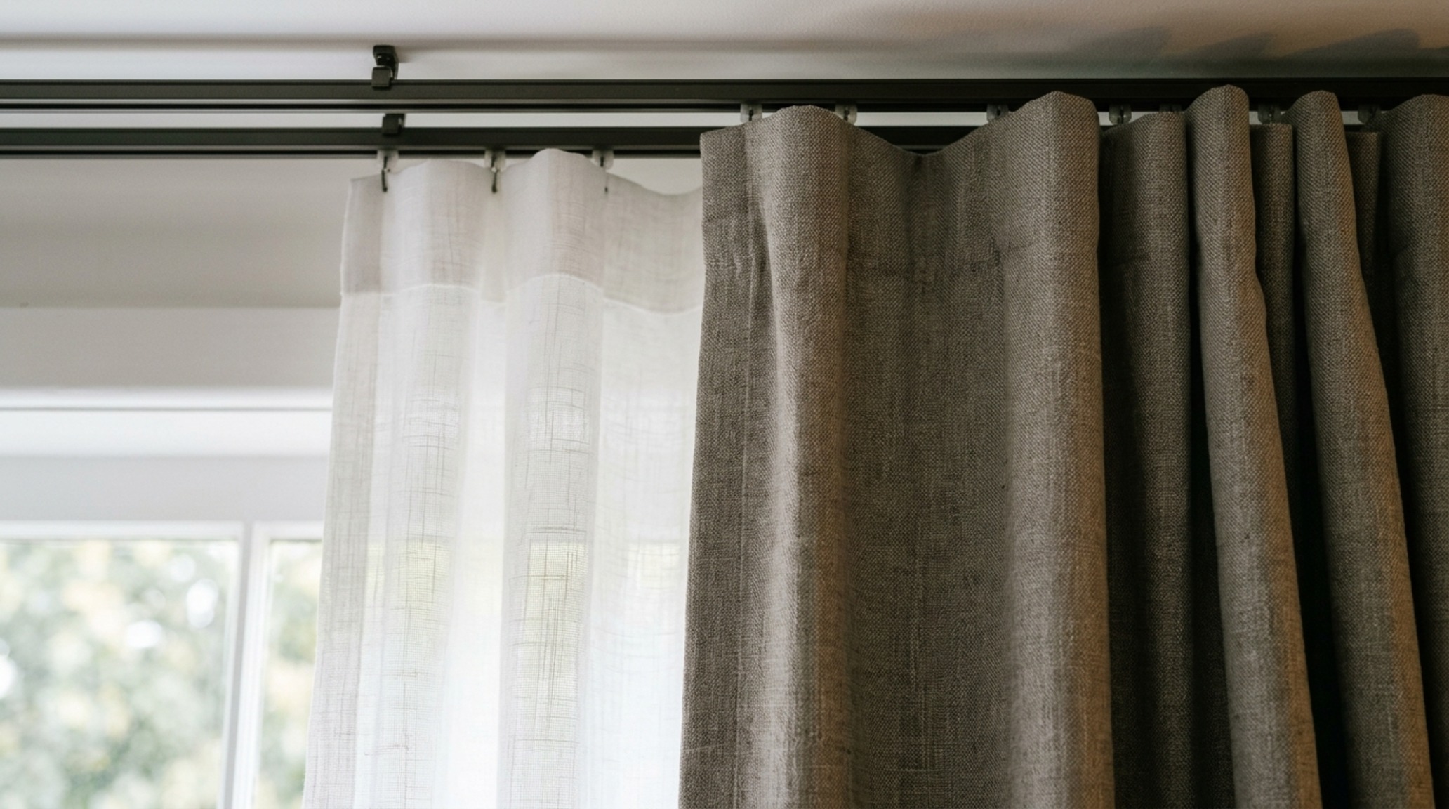 sheer and blackout layering techniques using a translucent linen scrim beneath a heavy mushroom-toned wool drape for versatile light control sheer and blackout layering techniques using a translucent linen scrim beneath a heavy mushroom-toned wool drape for versatile light control