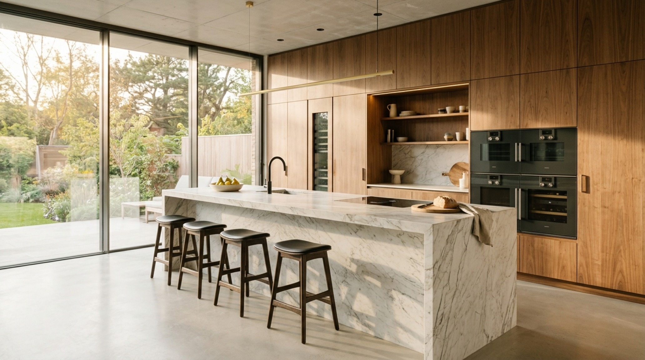 Minimalist kitchen layout ideas showcasing a seamless walnut cabinet wall and a parallel 48-inch deep stone island. Minimalist kitchen layout ideas showcasing a seamless walnut cabinet wall and a parallel 48-inch deep stone island.