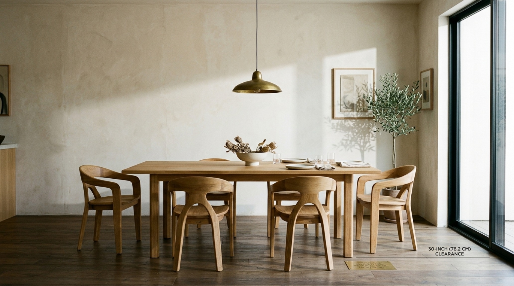 Interior design clearance measurements illustrated in a dining room with 30-inch chair push-back space and a central statement pendant. Interior design clearance measurements illustrated in a dining room with 30-inch chair push-back space and a central statement pendant.