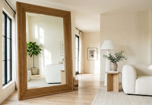 oversized floor mirror styling tips featuring a 7-foot fluted white oak frame leaning against a wall in Benjamin Moore Swiss Coffee with 36-inch walkway clearance