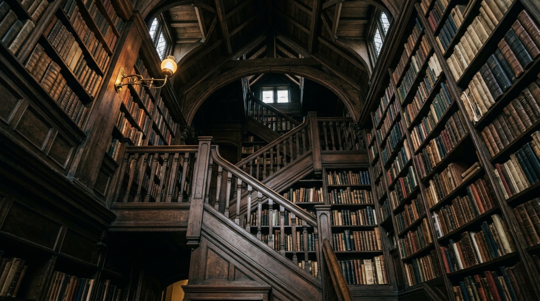 Editorial interior photography of a home library design integrated into a minimalist staircase with natural light and shadow play. Editorial interior photography of a home library design integrated into a minimalist staircase with natural light and shadow play.