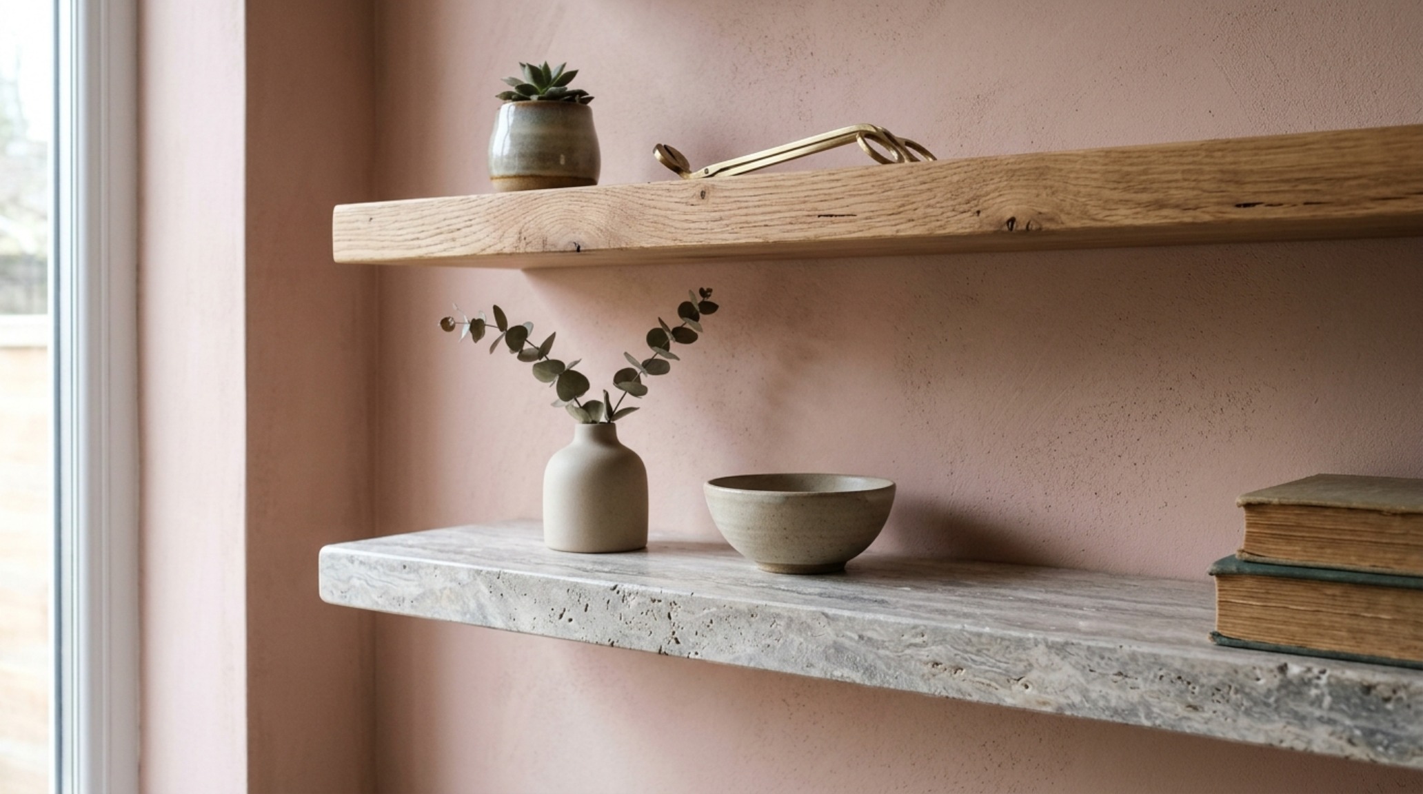Architectural display ledges made of honed travertine and oak against a Farrow and Ball Setting Plaster limewash wall finish. Architectural display ledges made of honed travertine and oak against a Farrow and Ball Setting Plaster limewash wall finish.