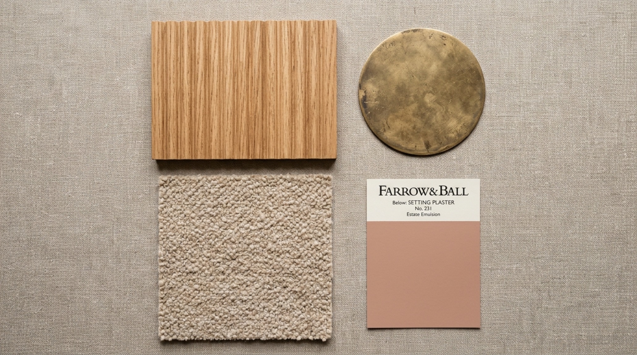 Material flat lay featuring white oak, travertine, and brass swatches used in Alexander Reid's interior design projects.