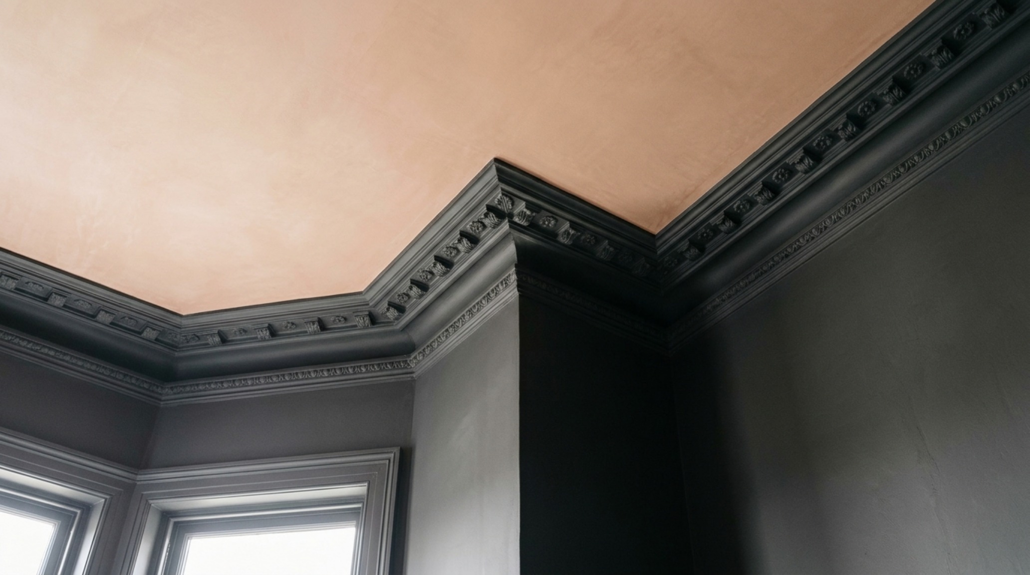 Architectural detail of a dark ceiling transition using Farrow and Ball moody color combinations like Railings and Setting Plaster. Architectural detail of a dark ceiling transition using Farrow and Ball moody color combinations like Railings and Setting Plaster.