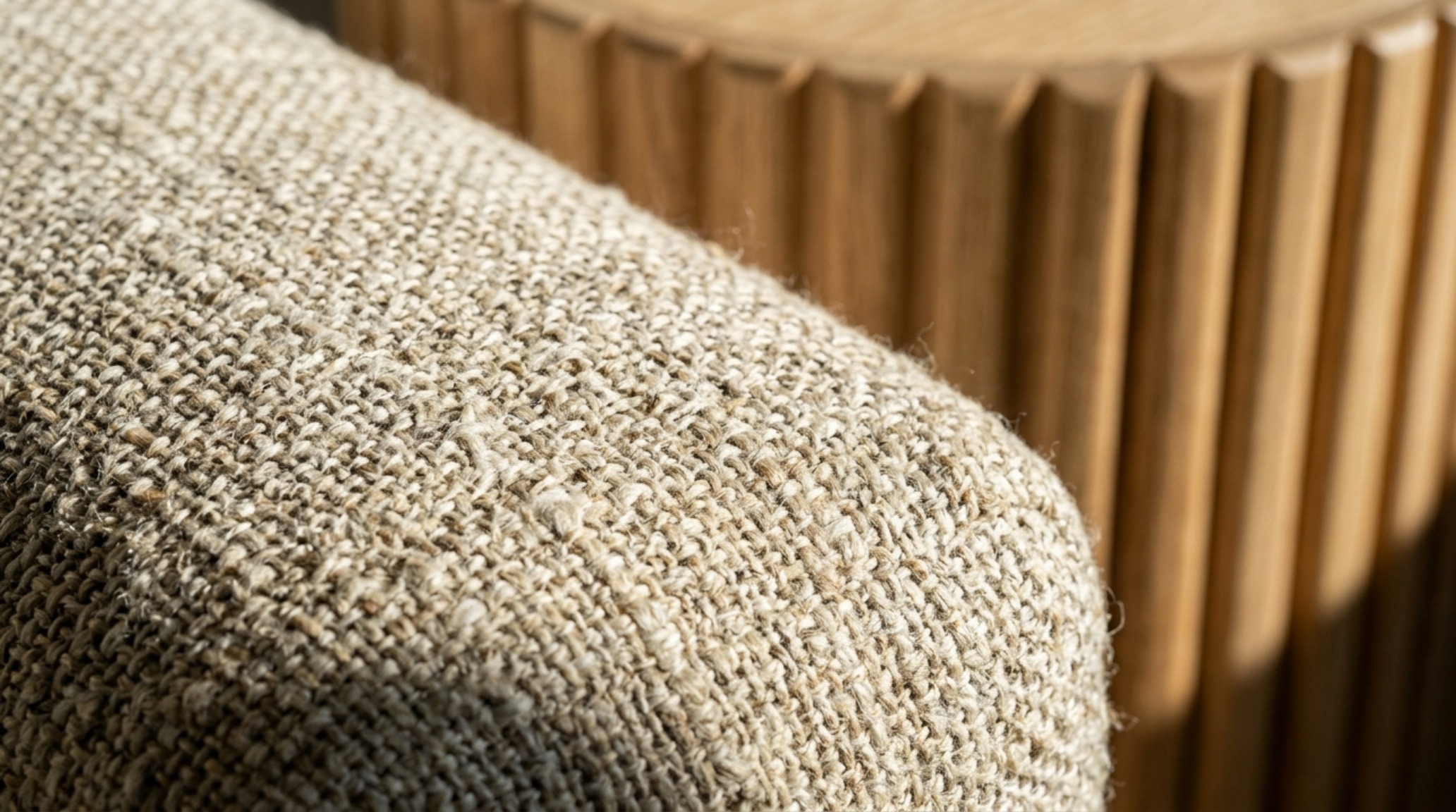 Macro detail of Belgian performance linen on a Pacific sofa, highlighting luxury best crate and barrel sofas guide decor ideas textures and weave density.
