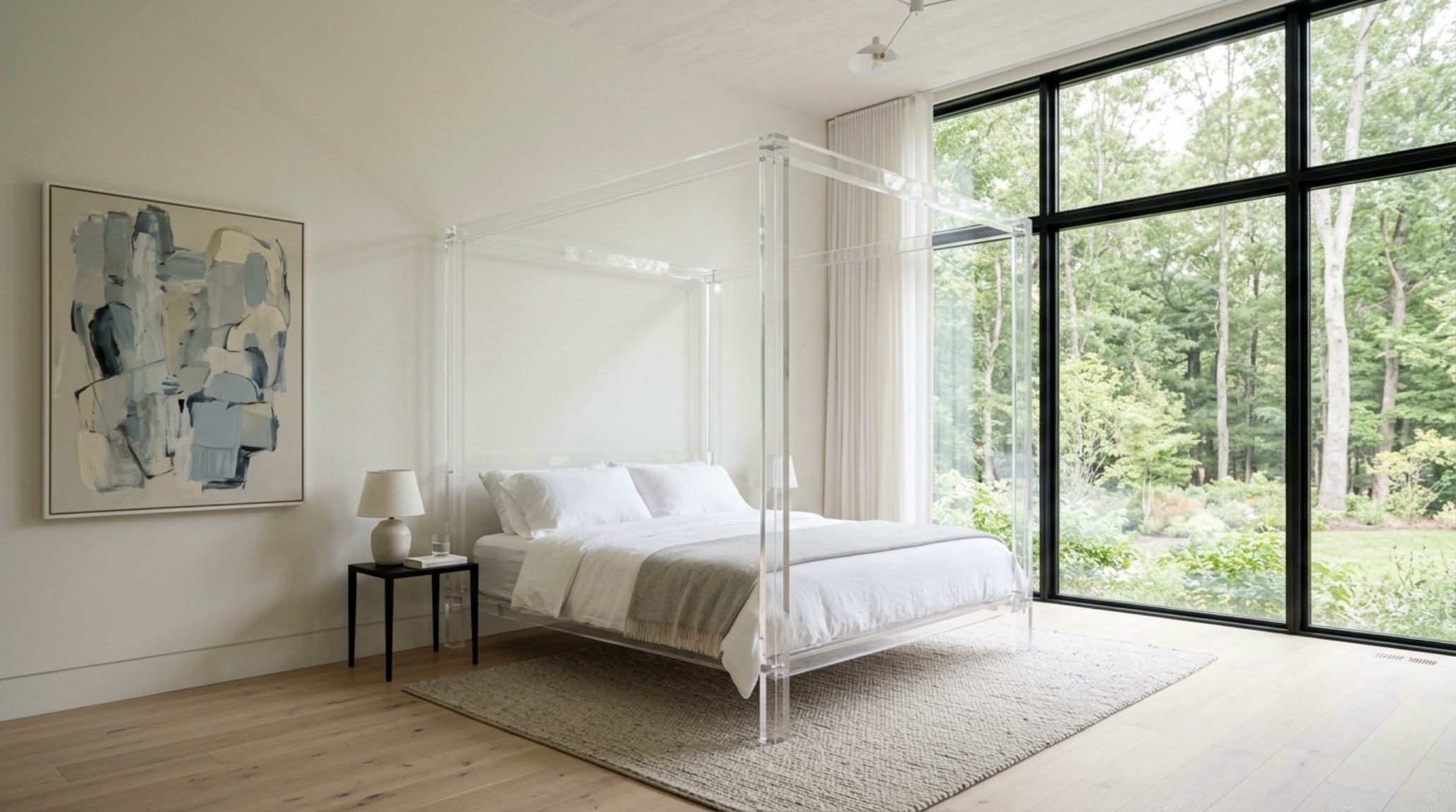 Minimalist pencil-thin canopy bed frame in a high-ceiling room, emphasizing verticality and canopy bed decor ideas for modern interiors.