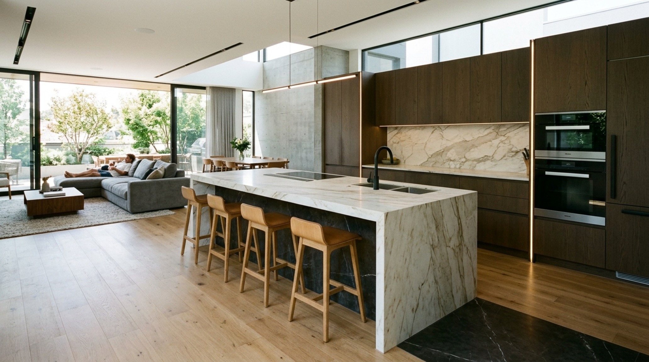 modern contemporary kitchen furniture ideas showcasing an open-plan island with a waterfall stone edge and 42-inch architectural clearance for optimal movement