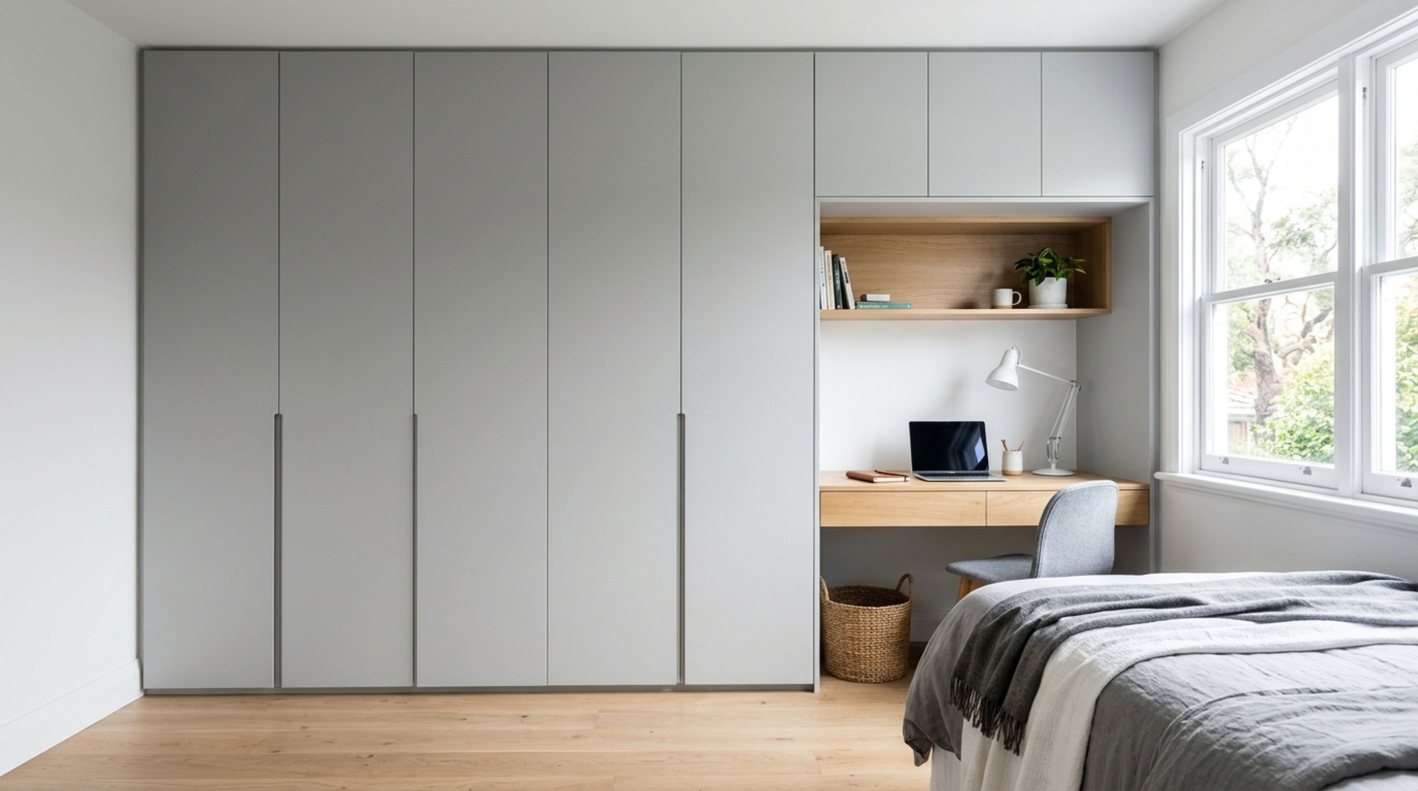 small space designs for small bedrooms with a custom built-in wardrobe and recessed shelving to eliminate visual clutter