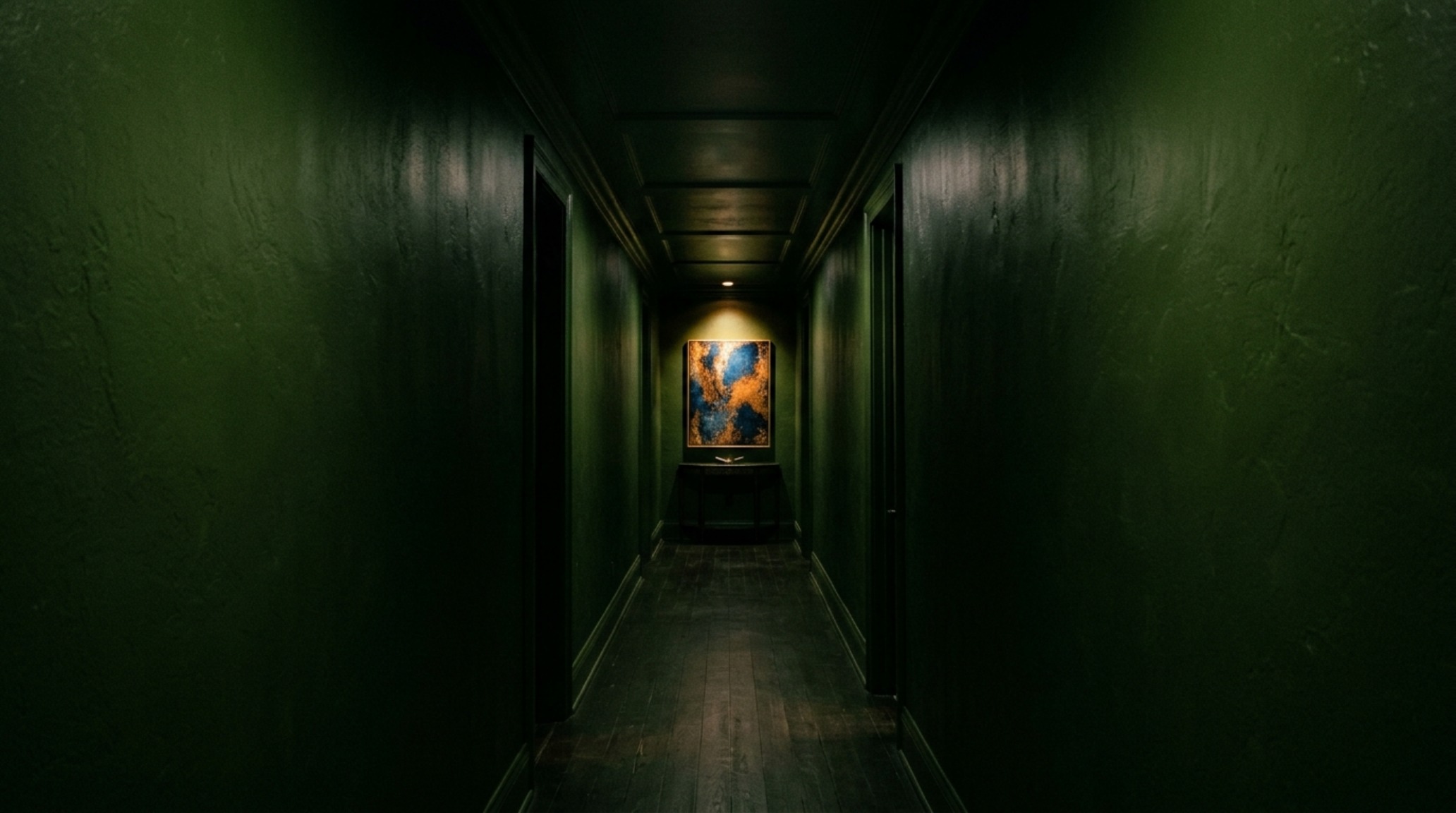 A transitionary hallway where the ceiling and walls are painted in a Disney Go Away Green inspired shade, creating a sense of visual spatial optimization and depth.