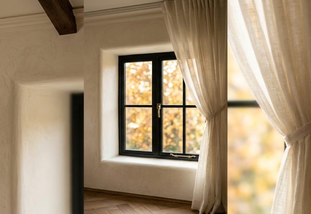 Warm minimalist window treatments featuring linen curtains and lime wash walls