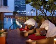Amazing Lebua at State Tower Hotel and Club Interior Design and Facilities: Adorable romantic outdoor swimming pool design with a red white unique rattan chair
