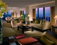 Amazing Lebua at State Tower Hotel and Club Interior Design and Facilities: Elegant sitting area with two soffas and a workspace interior design with green and brown theme