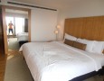 Amazing Lebua at State Tower Hotel and Club Interior Design and Facilities: luxury Tower Club River View Suite Bedroom of lebua at state tower in the white bedding