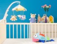 Beautiful baby girls bedroom design style ideas: designing a baby room in blue color with doll baby bedding in white cribs