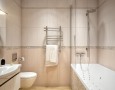 Best Modern Bathroom Design Ideas 2011 for Wide Spaces with Amazing Pattern: white simple bathroom decor pictures with mini glass separator and white bath up one toilet and hanging vanities