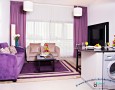 Comfortable Auris Metro Central Hotel Apartments and The Wonderful Purple Interior Designs: Best idea for minimalist dining table design with washing machine under it