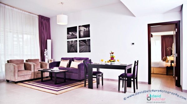 Comfortable Auris Metro Central Hotel Apartments and The Wonderful Purple Interior Designs: Sweet auris metro family suite with a dining table for 2 and cream and purple sofa 600×336 1