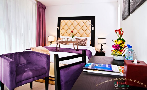 Wonderful Director Suite Master Bedroom with purple and white theme in auris methor hotel
