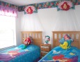 Cute Bedroom Design for Kid with Cartoon Characters Theme: twin bed with the little mermaid cartoon bed design idea