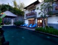 Exotic Khayangan Dreams Villa Seminyak Bali Indonesia with Tropical Nuance: large private swimming pool with waterfall stone sculptur for two bedroom suite in khayangan villa