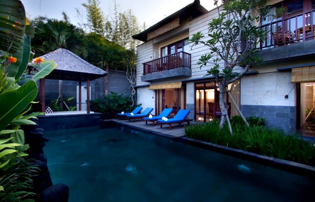 Large Private Swimming Pool With Waterfall Stone Sculptur For Two Bedroom Suite In Khayangan Villa 600x386 1