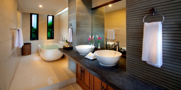 : Luxury Art Deco Bathroom Ideas With Big White Bathtub And Elegant White Sink Decorated With The Brick Stone Wall Texture