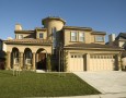 Good Plan for A Prosperity in A Peaceful Dream Home: Classic-home-design-with-a-quarter-circle-area-and-unique-high-window