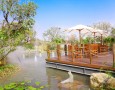 Good Plan for A Prosperity in A Peaceful Dream Home: Romantic-outdoor-dining-area-with-a-beautiful-landscape-and-pond