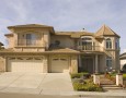 Good Plan for A Prosperity in A Peaceful Dream Home: Timeless-Home-Design-with-a-large-green-front-yard-and-garage