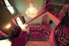Rearrange Living Room With Red Sofa In An Amazing Purple Green Living Room Design Idea 600x385 1 Scaled