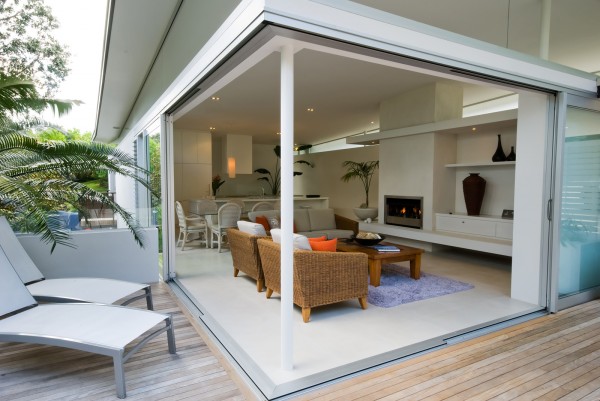 set up family room with semi outdoor living room design with a glass sectional