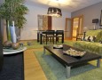 How to Set Up and Arrange A Living Room: set up living room furniture with green modern couch and dining table idea